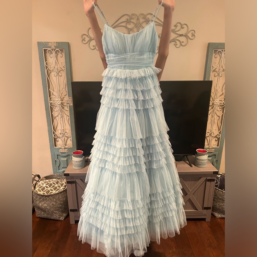 Light blue dress from Dillards. Size: 3/4. Formal wear.
